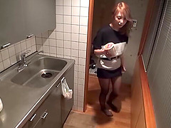 Japanese chick enjoys while getting fucked in the kitchen