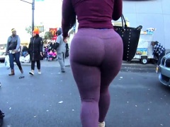 Big booty amateur babe in tight purple pants goes for a walk