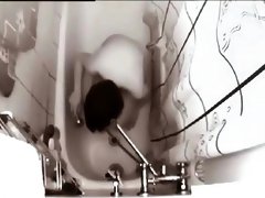 Relaxed masturbation in the bathtub gets her off