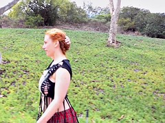 Busty ginger with massive tits teasing in the woods