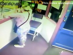 Blonde woman pisses right in front of the receptionist's desk