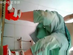 Cute asian spied in public toilet pissing
